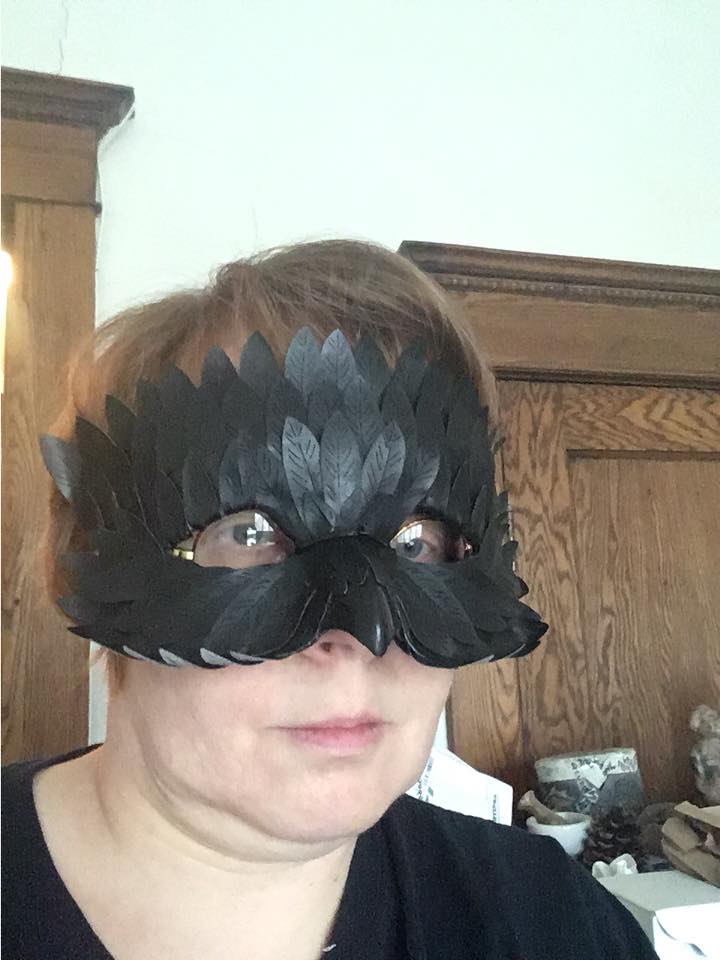 Me wearing crow mask for furry convention